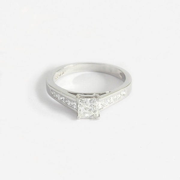 a beautiful diamond square shaped ring in platinum