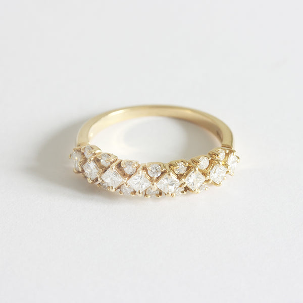 a yellow gold modern diamond set cluster ring 