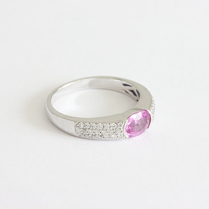 a pink sapphire diamond band in white gold