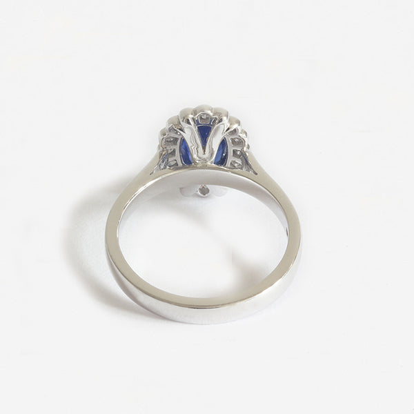 a modern white gold sapphire diamond cluster ring oval 