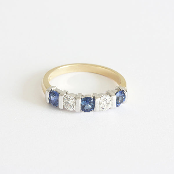 a stunning sapphire diamond 5 stone ring in gold