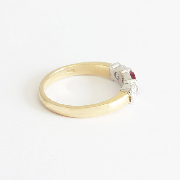 a new gold ring with rubies and diamonds 