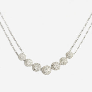 a modern diamond cluster pendant necklace white gold