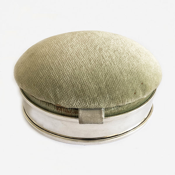 an antique edwardian oval silver and velvet green dressing table box 