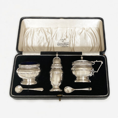 a silver vintage 3 piece cruet set birmingham 1940 with original case box