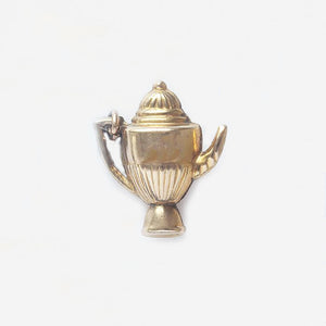 a yellow gold coffee pot in yellow gold vintage charm