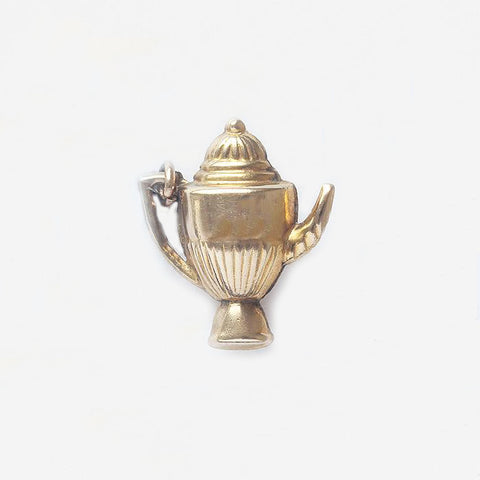 a yellow gold coffee pot in yellow gold vintage charm