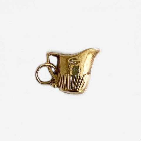 a yellow gold vintage cream jug charm