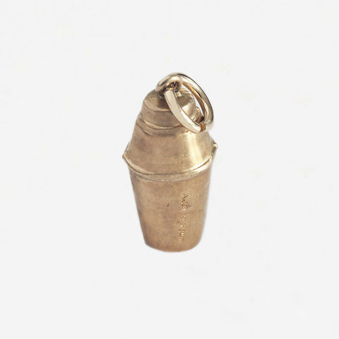 a yellow gold cocktail shaker charm