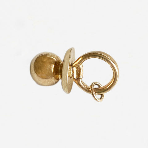 a yellow gold dummy charm hollow 