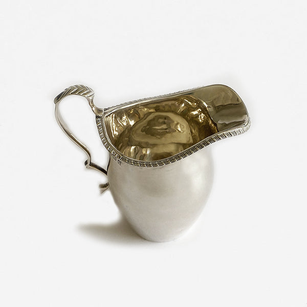 plain silver cream jug dated 1931