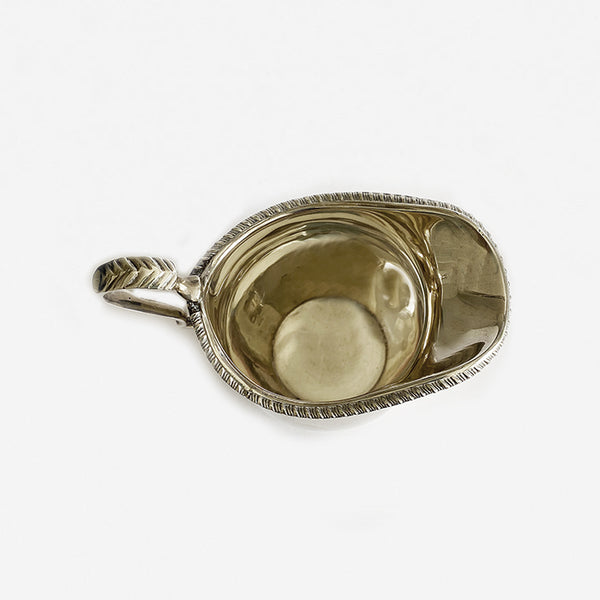 a silver hallmarked plain cream jug from marston barretts the jewellers