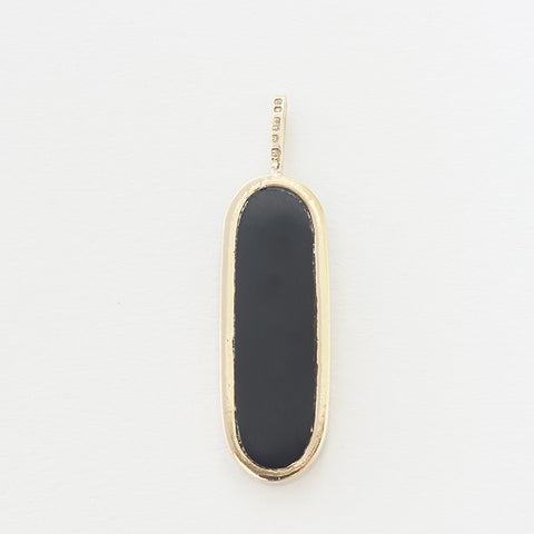 an oblong onyx and yellow gold pendant with hallmark secondhand 