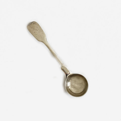 a silver victorian salt spoon dated 1884