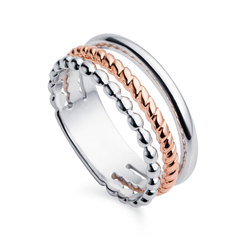 a sterling silver rose gold trio ring by christin ranger