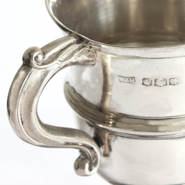 a small trophy cup in silver dated Sheffield 1930 by walker & hall maker