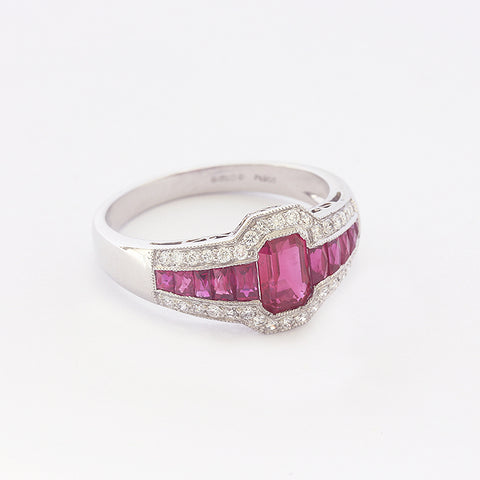 a beautiful modern ruby and diamond cluster ring in platinum